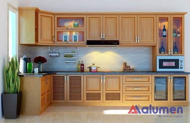 Tủ bếp chữ L nhôm kính sang trọng